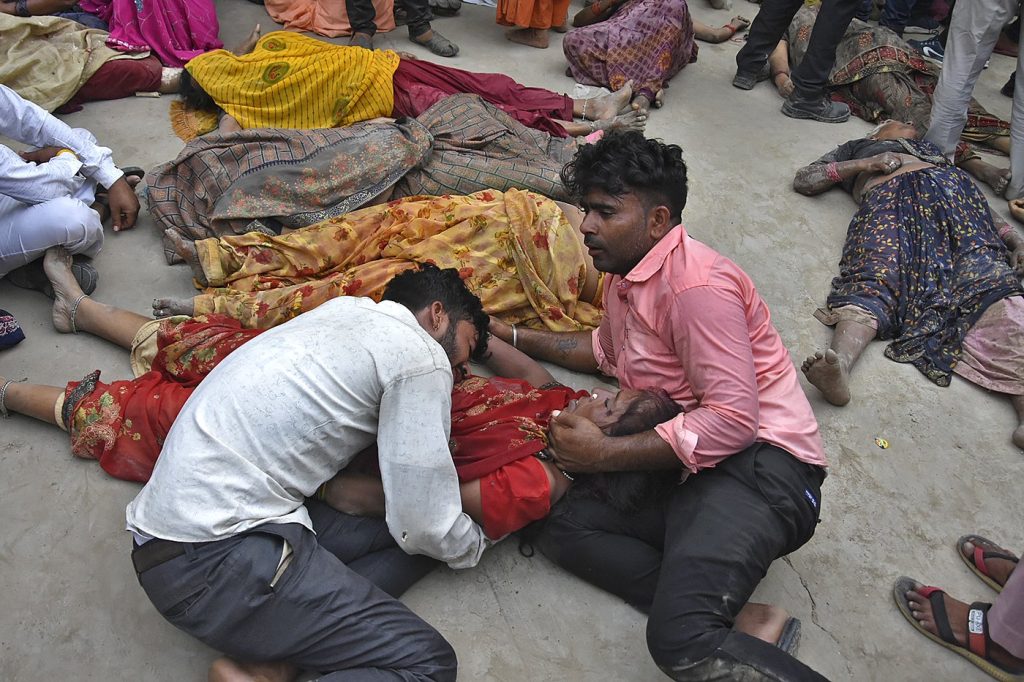 At least 60 are dead and scores are injured after a stampede at a religious event in northern India